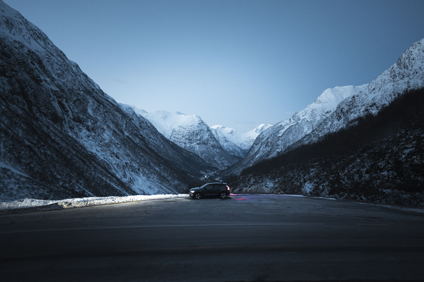 Close-up of the green-tinted or eco-labeled tread compound of a winter tire.