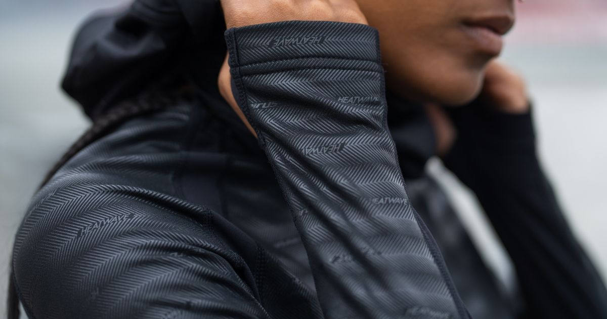 Close-up detail of the Heatwave base layer fabric on a person.