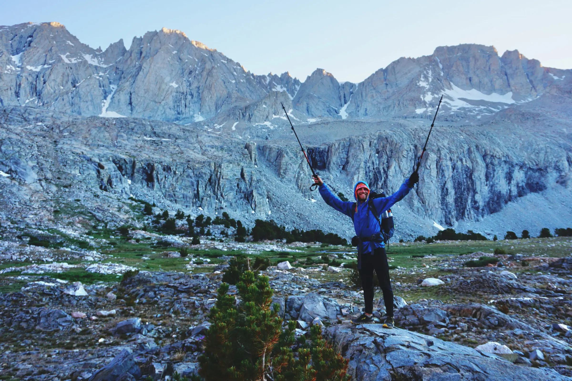 A hiker on the Pacific Crest Trail wearing the Patagonia Houdini windbreaker.