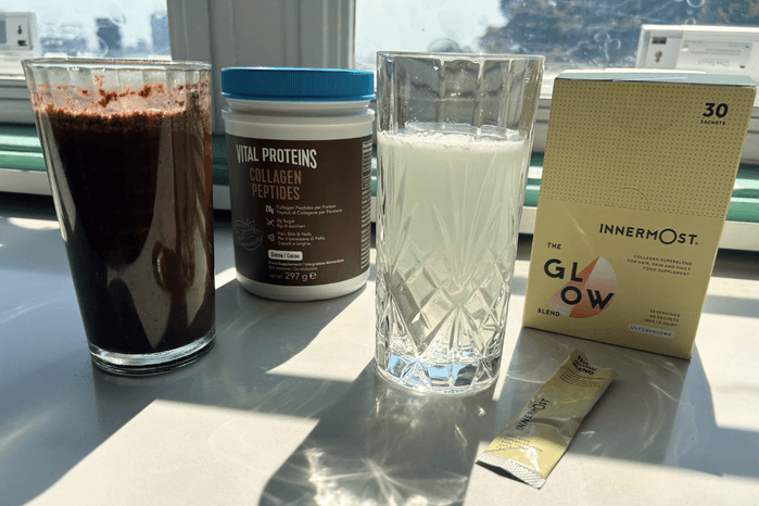 Several glasses filled with different dissolved collagen powders arranged for a comparative test.