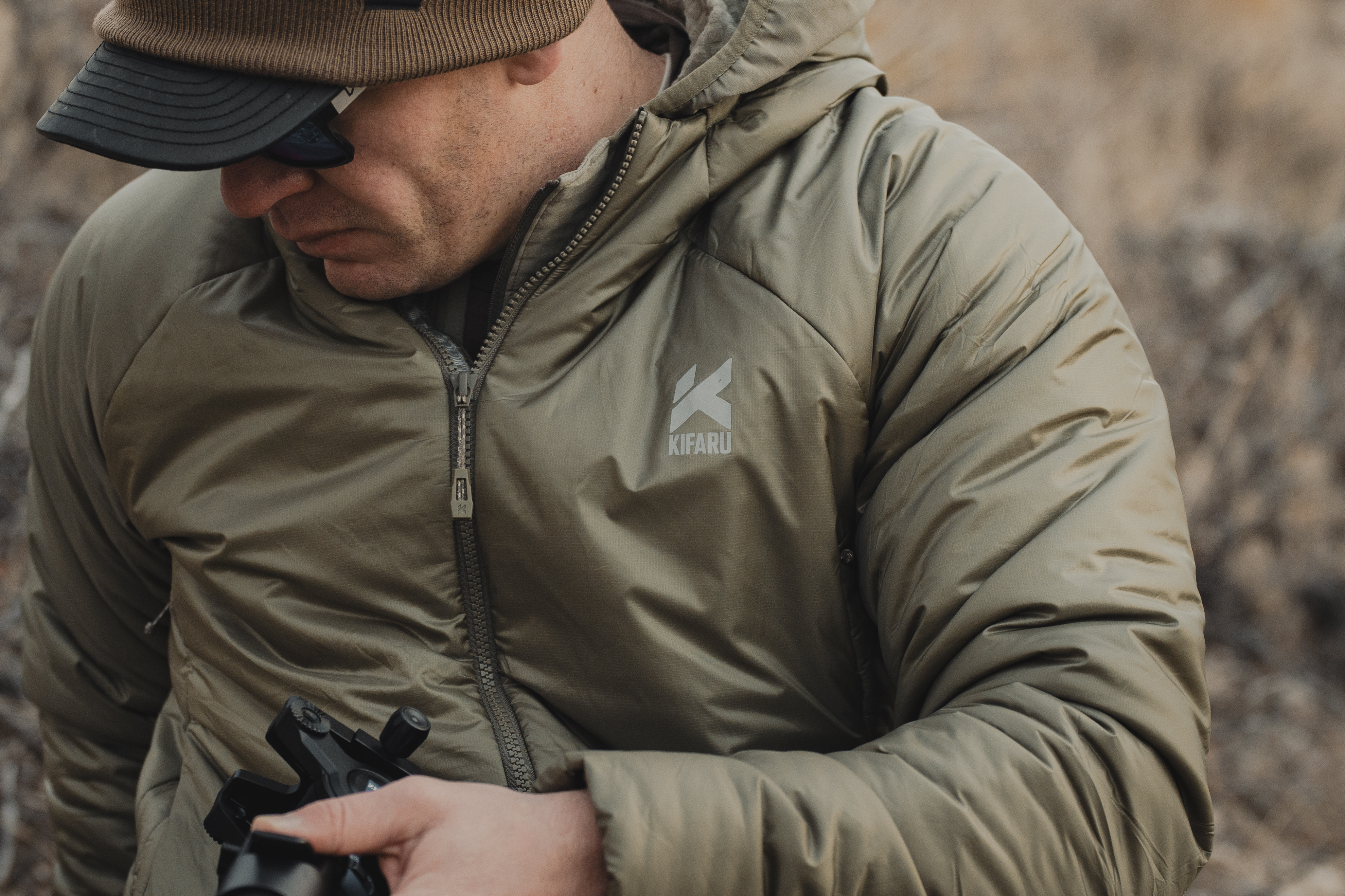 Close-up detail of the 20D ripstop nylon shell on a Kifaru jacket.