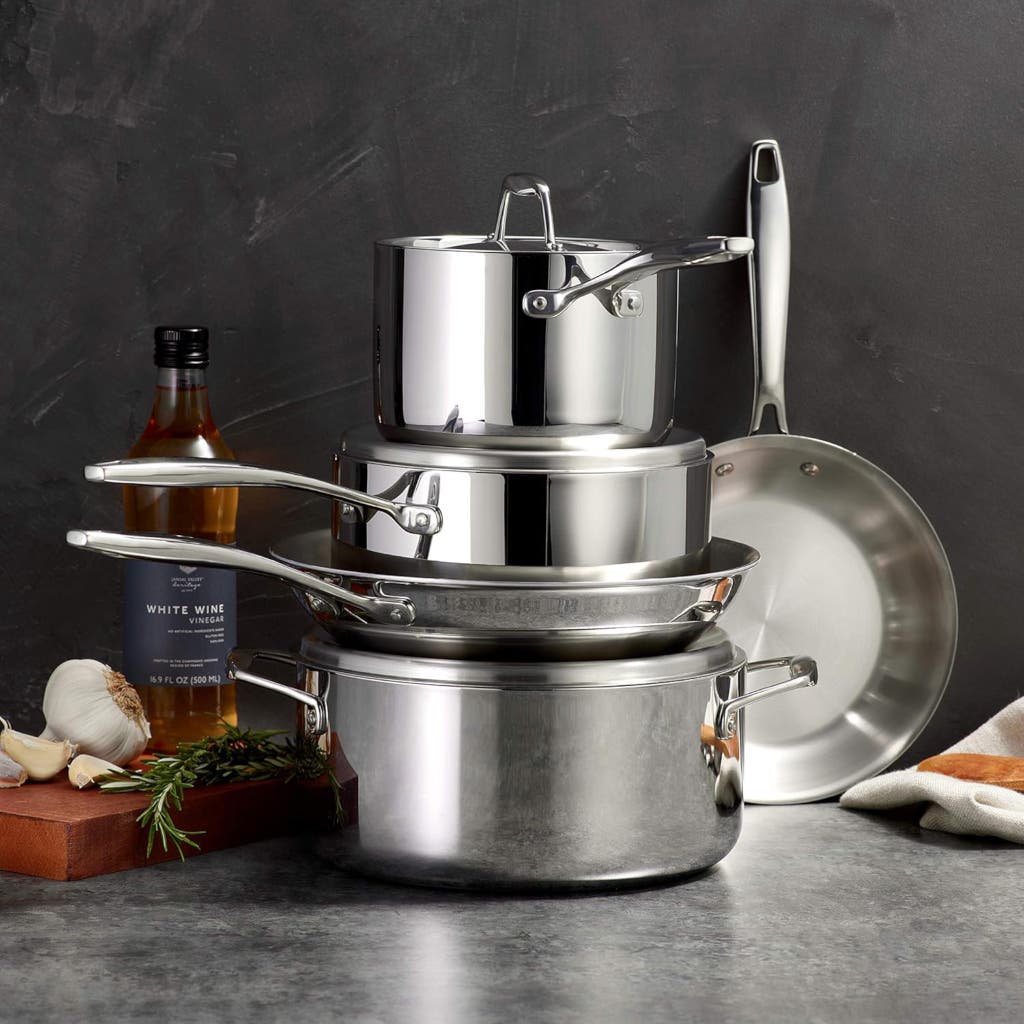 A multi-piece stainless steel cookware set highlighting the reflective, durable finish.