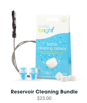 A collection of HydraPak Bottle Bright cleaning tablets and specialized reservoir cleaning tools.