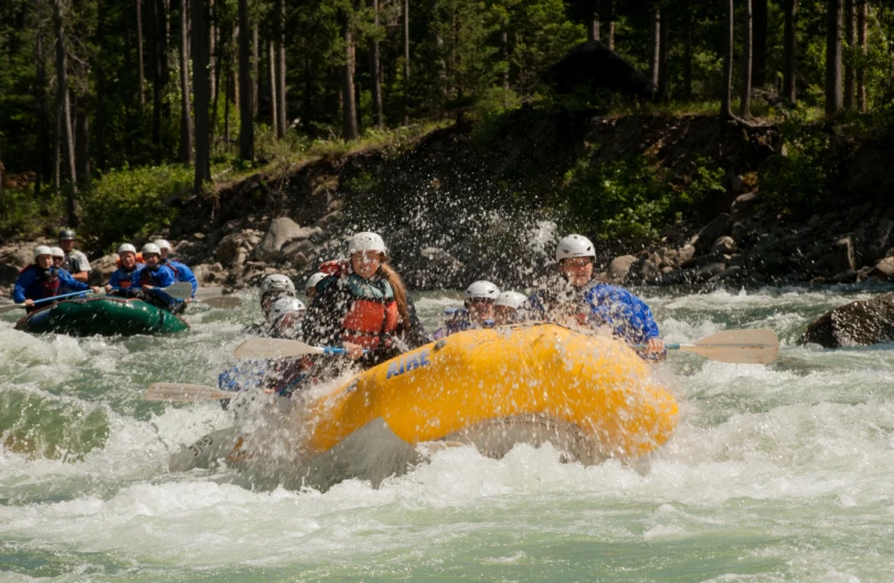 A rafting expedition navigating a remote river on the Flathead Indian Reservation in Montana.