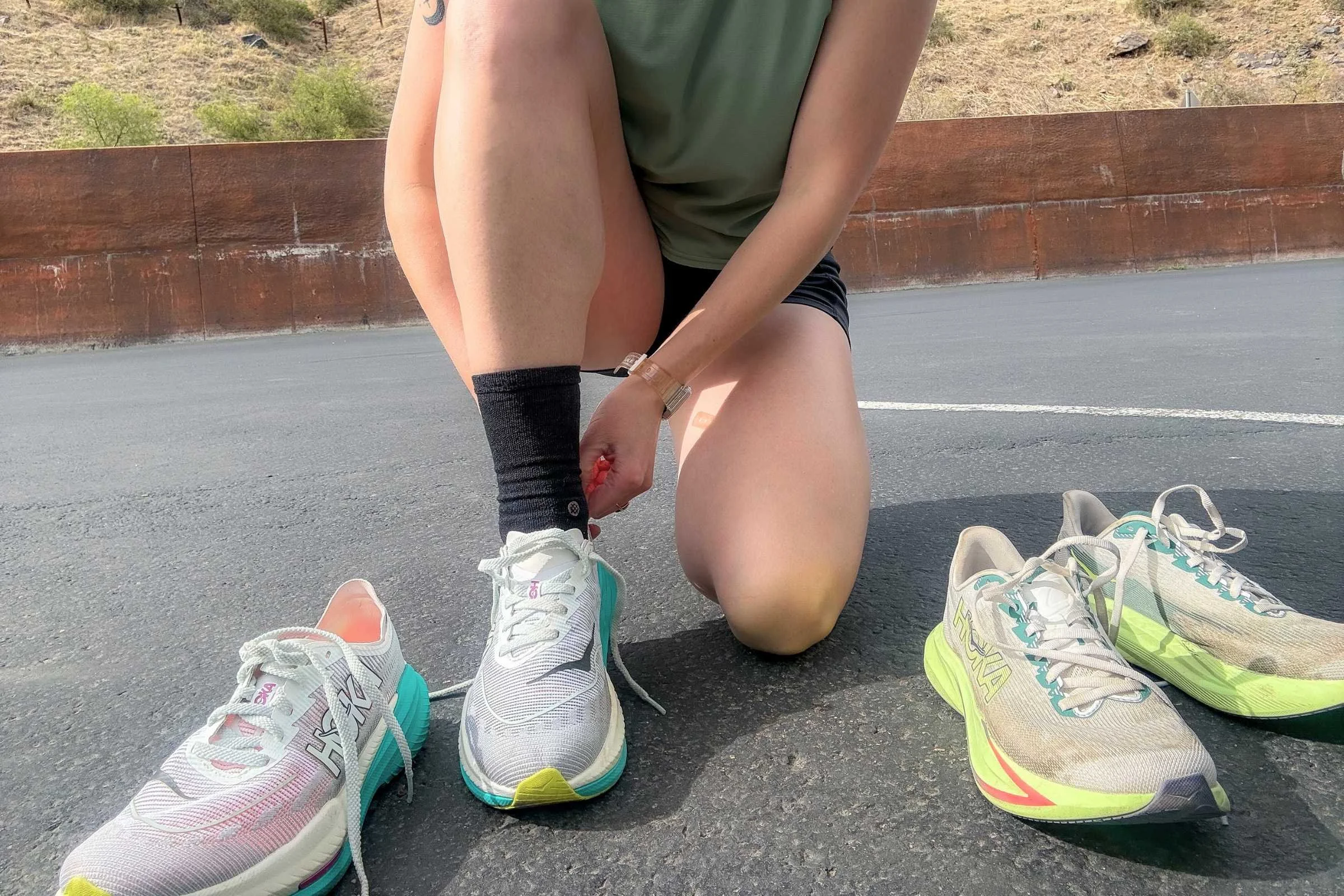 The HOKA Mach 7 placed next to the HOKA Mach X 2 for a side-by-side design comparison.