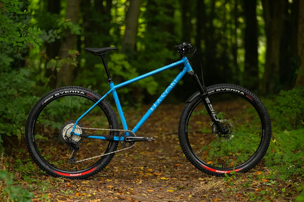 A Mason Raw steel hardtail mountain bike showing its slender frame tubes.