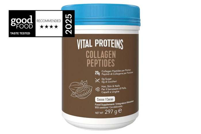 A container of Vital Proteins cocoa flavored bovine collagen powder.