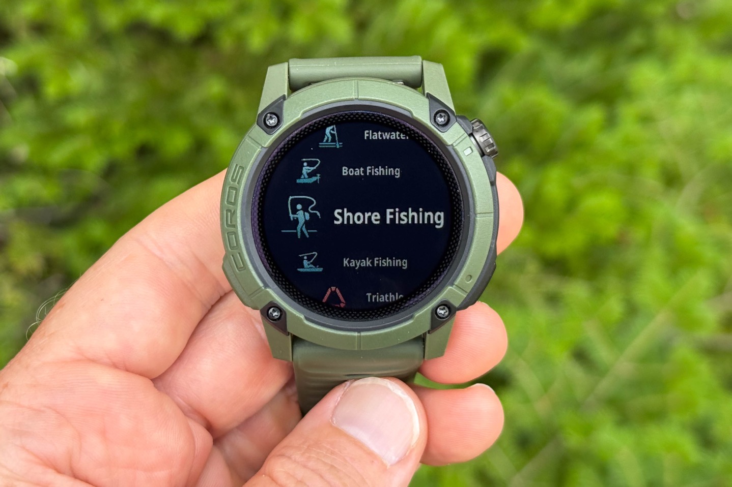 A close-up of the COROS NOMAD screen showing different fishing activity profiles like 'Shore' and 'Offshore'.