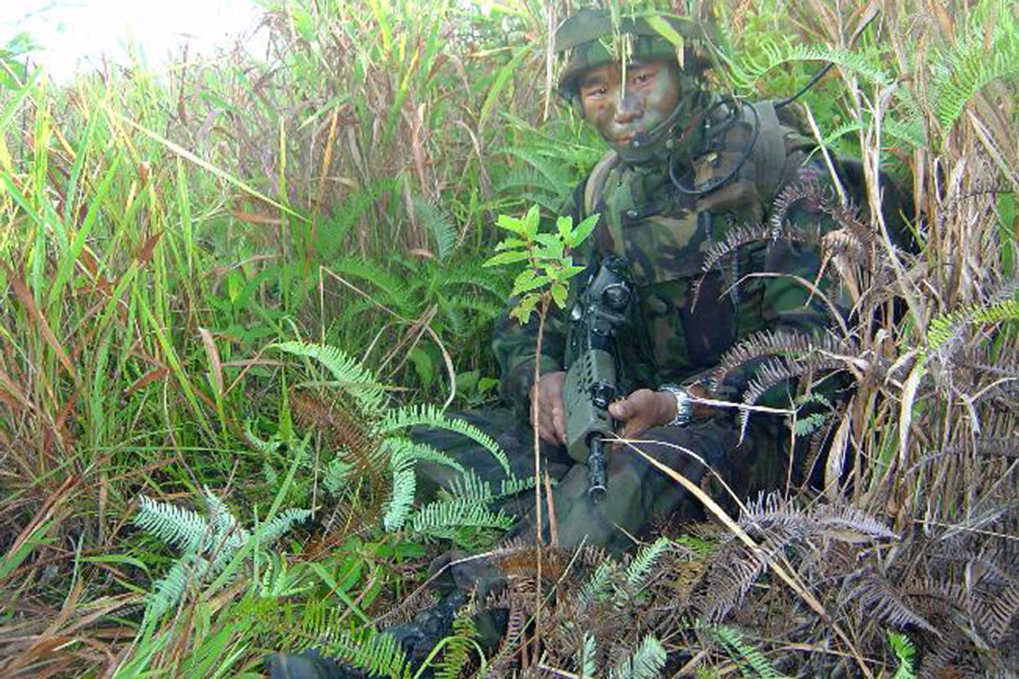Portrait of Hari Budha Magar in his formal Royal Gurkha Rifles military uniform.