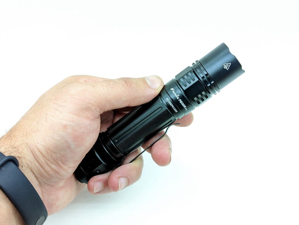 The Fenix PD36R Pro tactical flashlight shown from a side profile.