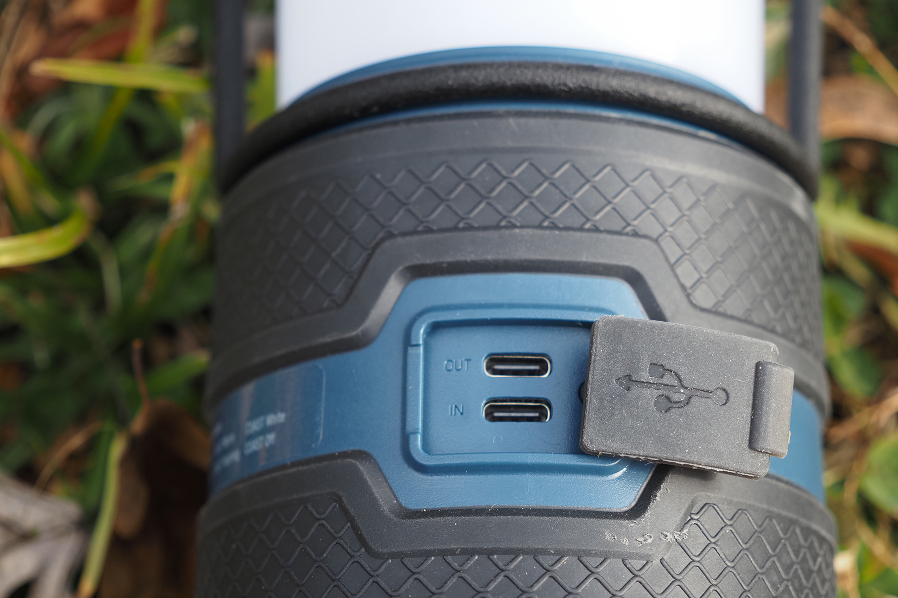 Close-up detail of the USB-C input and output ports on the side of the lantern.