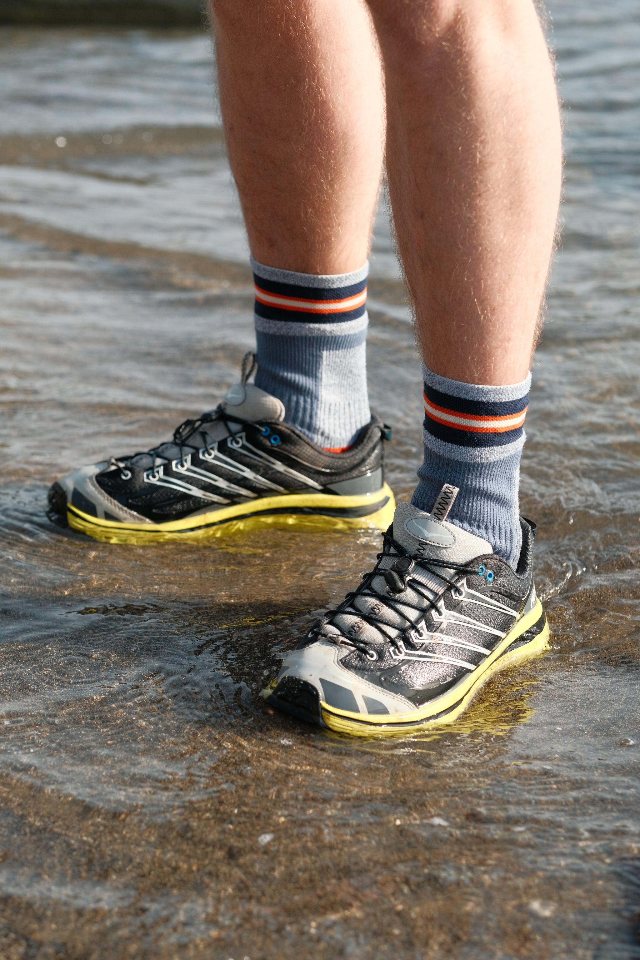 A detailed close-up shot of the knit texture and cuff of a high-performance waterproof sock.