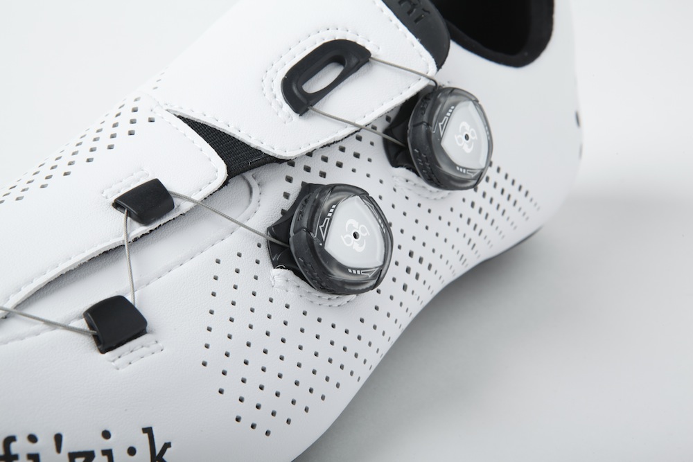 Close-up of BOA dial closure system on a cycling shoe.