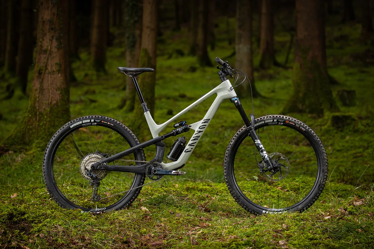 Full suspension Canyon Spectral CF7 mountain bike in a forest setting.